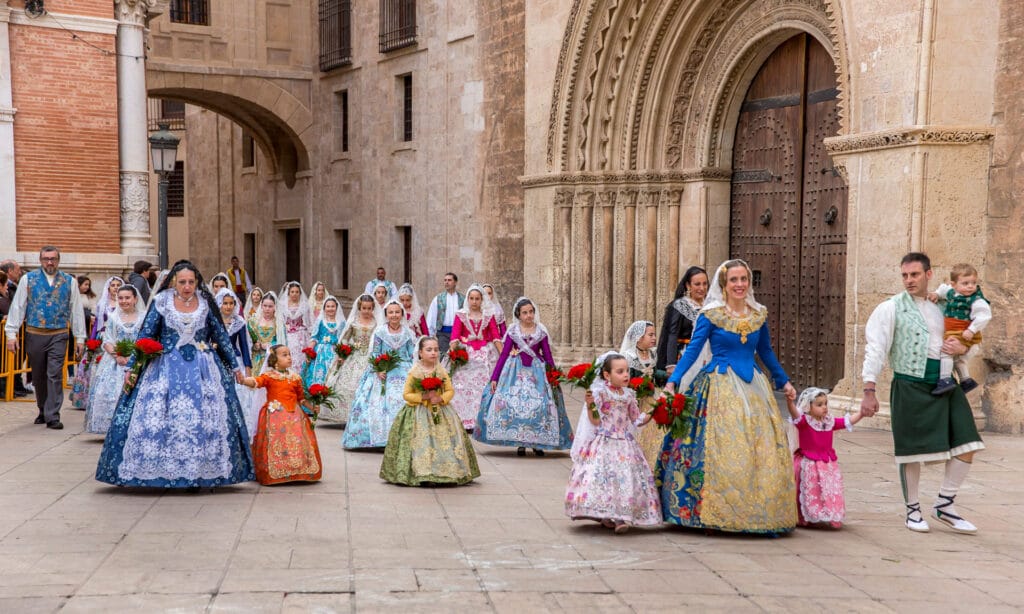 All generations of Falleras dressed for the Parade in the Valencia Fallas Festival 2024