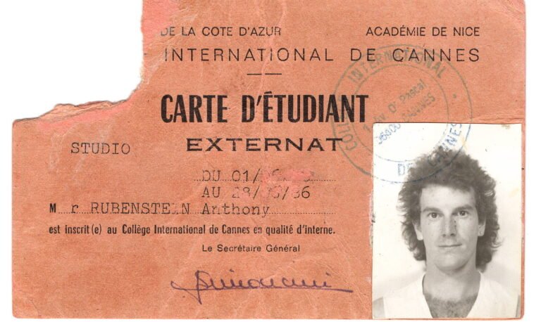 Inside the Running of the Bulls: A Complete Cultural Guide to Pamplona’s San Fermín Festival photo | Cosmopolitours Vintage student identification card from the Collège International de Cannes in France, issued to Anthony Rubenstein featuring a passport-style photo and handwritten signature.